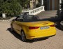 Das neue Audi A3 Cabriolet in Gelb in der Heckansicht