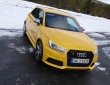 Gelber Audi S1 Sportback Quattro Fünftürer