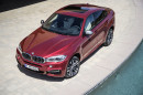 Exterieur Fotoaufnahme von einem BMW X6 M50d in rot