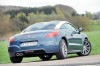 Peugeot RCZ in Blau in der Heckansicht 2013er Modell