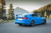 Jaguar XFR-S in blau in der Heck- Seitenansicht