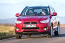 Die Frontpartie eines roten Mitsubishi ASX 1.8 DI-D Cleartec 2WD