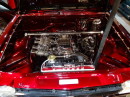 Blick unter der Motorhaube eines Opel Kadett Coupé