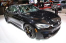 2014er BMW M4 Coupé in schwarz auf der Detroiter Autoshow 2014