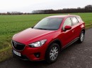 Außenaufnahme vom roten Mazda CX-5 Skyactiv-D Center-Line FWD