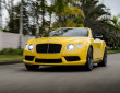 Bentley Continental GT V8 S Cabriolet in gelb in der Frontansicht
