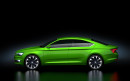 Grüner Skoda Vision C in der Seitenansicht